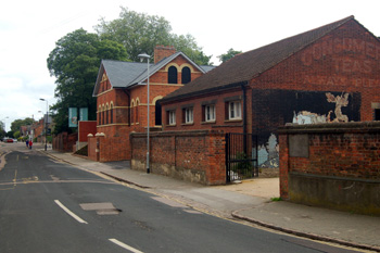 Castle Lane looking towards the Castle Rooms